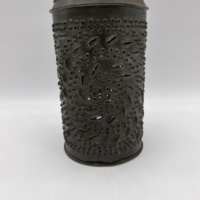 19th Century American Hand Punched Tin Candle Lantern with Pinwheel Motif An exceptional 19th-century Early American hand-...