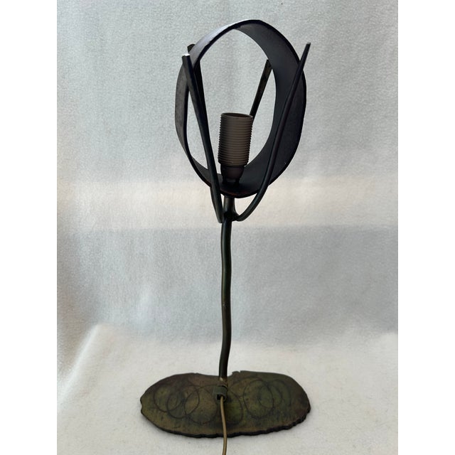 A bold and striking Antique Bronze Industrial Brutalist Sculptural Table Lamp, showcasing a strong architectural presence...