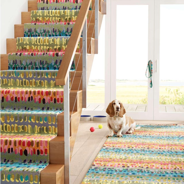 Why choose one color when you can have them all? This rug features a brilliantly abstract pattern in varying shades of...