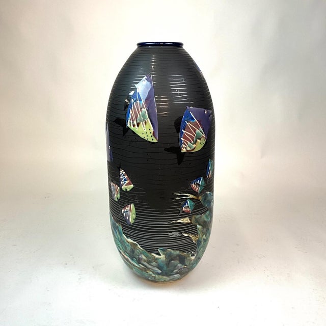 Large studio art pottery vase by Michael Alvord Remsen, signed and dated 1998. This striking piece features applied...