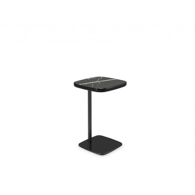 End of sofa, side table with lacquered details and Metal lacquered structure, marble top Black lacquered metal leg....