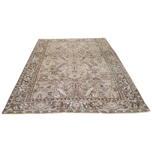 Hand-knotted with care using traditional rug-making techniques, this wool rug blends timeless craftsmanship with a modern...