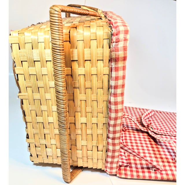 Vintage red and white gingham accent and line this vintage picnic basket. This is a *seriously vintage * piece. I would...