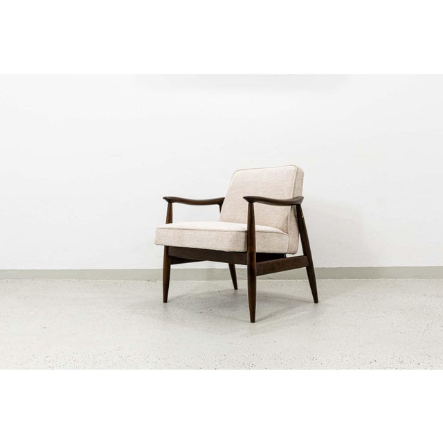 A gfm-87 armchair designed by juliusz kędziorek, manufactured at the gościcińska fabryka mebli (gfm), poland, in the...