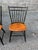 Set of 4 signed Hitchcock birdcage side chairs Due to age and use, Hitchcock marks are fading and hard to see Splay legs,...