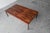 This is a stunning Danish modern coffee table crafted in richly figured Brazilian rosewood, circa 1960s. The rectangular...