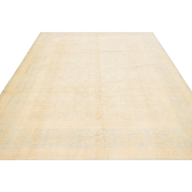 2010s Modern Khotan Beige Handmade Wool Rug With Blue Geometric Design For Sale - Image 5 of 9