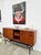 Sideboard designed by alain richard, produced by caminelle, france, 1960s. Deep, nuanced teak veneer on a remarkably...