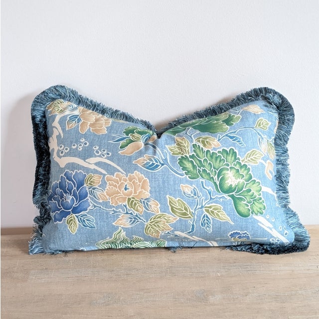 Brunschwig & Fils chinoiserie shishi dragon print in teal with blue brush fringe. Hidden zipper and professionally serged...