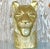 This vintage brass tiger head sculpture is a powerful decorative object that captures the commanding presence and...