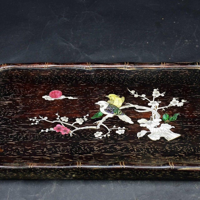 This is an elegant, vintage rectangular tray, crafted from Zitan wood (purple sandalwood) and decorated with delicate...