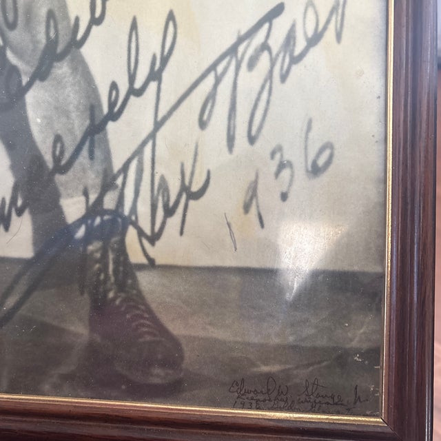 This is an amazing signed photograph of Max Baer Sr. in a boxing pose dated 1936. He was heavyweight champion from...