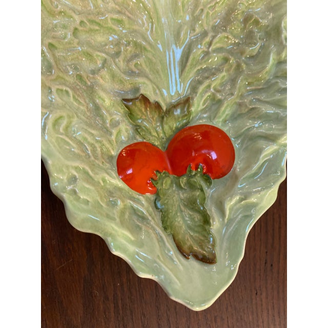 1900’s lettice plate made in the UK. Pale green with a tomato detailat the handle. Makes a nice addition to your serving...