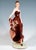 Excellent goldscheider ceramic figurine of the late 1930s: young, pretty lady with her hair combed back, wearing an off-...