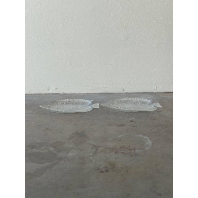Charming vintage Arcoroc France pressed glass fish plates, perfect for adding a playful yet elegant touch to your table...