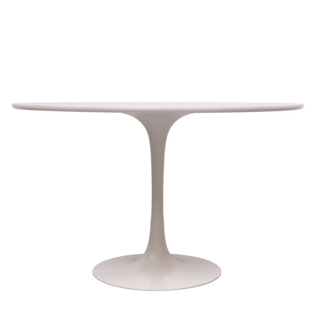 Beautiful Round Tulip Dining table . Metal Tulip shaped base ,comes with a Laminated top. Manufactured by Arkana Design by...