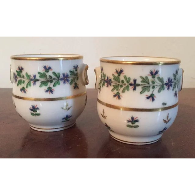 Pair antique late 18th / early 19th century French Empire Old Paris porcelain pot de creme urns in the sprig or cornflower...