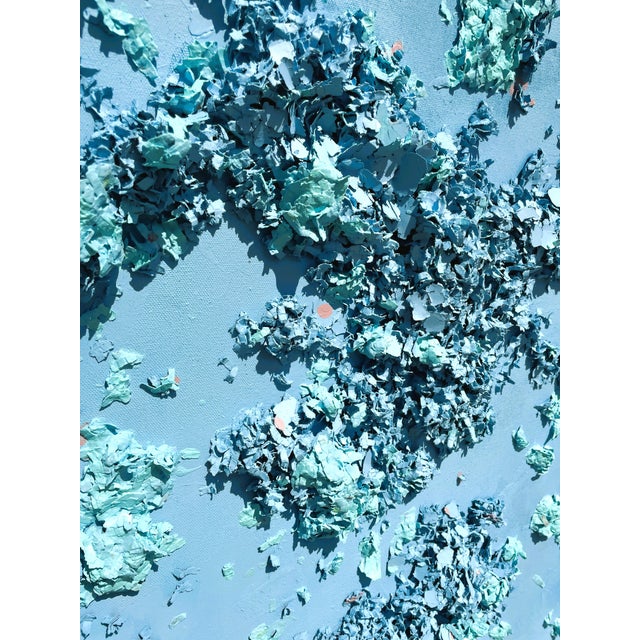 Add a radiant pop of cyan to your interior with dimensional wall decor from Covet Studio that captures the sense of...