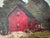 A charming control painting of a red barn and landscape. Signed Zeller. Custom gold wooden frame.
