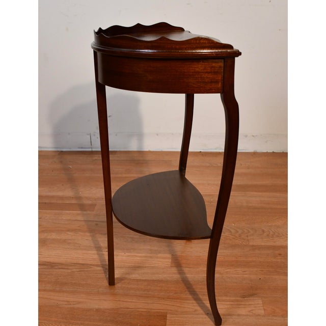 We are pleased to offer this Beautiful English style side table, from the 1940s. This table is made of Mahogany wood,...