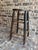 A charming vintage rustic stool with classic farmhouse character. This counter-height piece stands approximately 24″ tall...