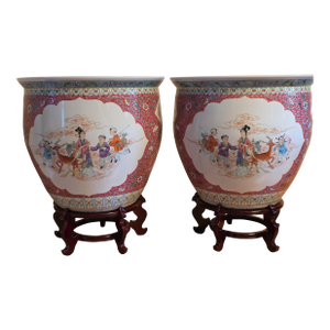 Mid-20th Century Chinese Ruby Ground Famille Rose Fish Bowls on Carved Stands - A Pair
