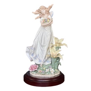 This Is a Limited Edition Lladró "Mystical Garden" Figurine,featuring a Fairy Holding Flowers. For Sale