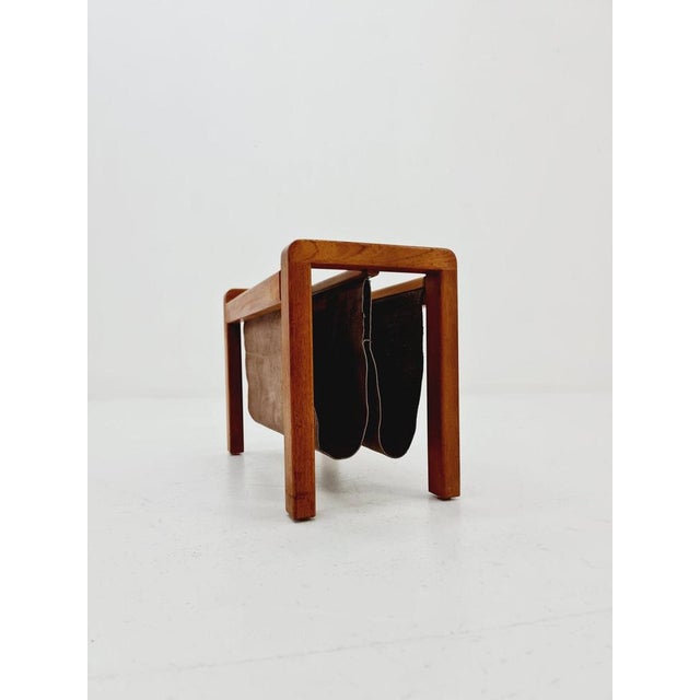 Danish Mid century Solid teak And Suede magazine rack by Salling stolefabrik, 1960s Dimensions: : 26 D x 53 Wx 36 H cm The...
