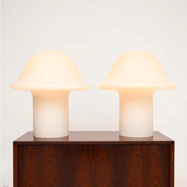 A stylish and very impressive pair of large vintage Murano glass mushroom lamps. The glass was hand blown in Murano Italy,...