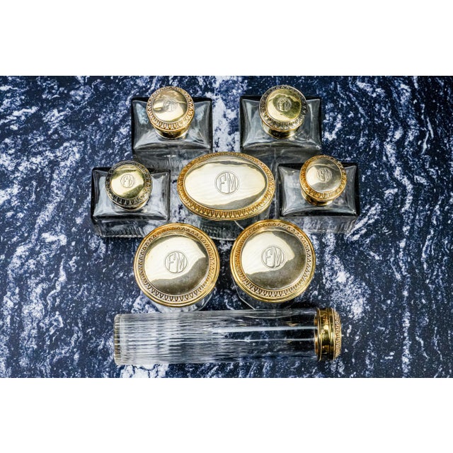 This Gilded Age vanity set, dating to around 1910, is far more than a collection of grooming tools—it is a rare and...