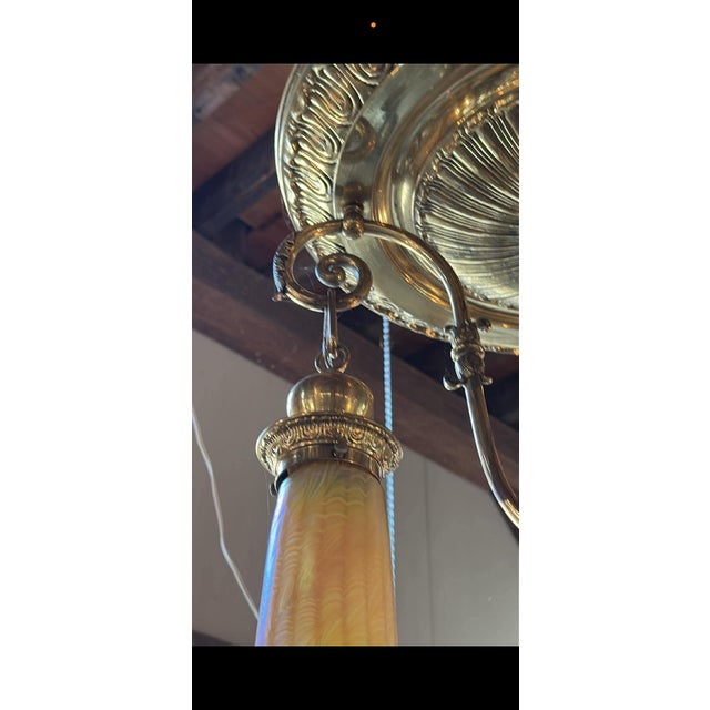 Old Lights On is pleased to offer this amazing vintage brass four light ceiling fixture with four Lundberg Studios art...