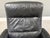 A black leather Stressless Recliner lounge chair made by Ekornes with a black ebonized color base. We believe it’s a size...