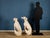An elegant pair of greyhounds crafted from Tuscan white porcelain, dating back to the early 20th century. The sculptures...