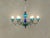 Postmodern chandelier in the style of Gio Ponti from the 1980s. High-quality metal frame with glass elements made of...