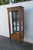 This Bookcase display Cabinet is made of wood, solid wood, maple, veneer, and glass. The Bookcase has a great Hollywood...