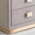 Nightstand Rubik with a solid wood structure, covered with light grey suede leather. With emperador dark marble top....