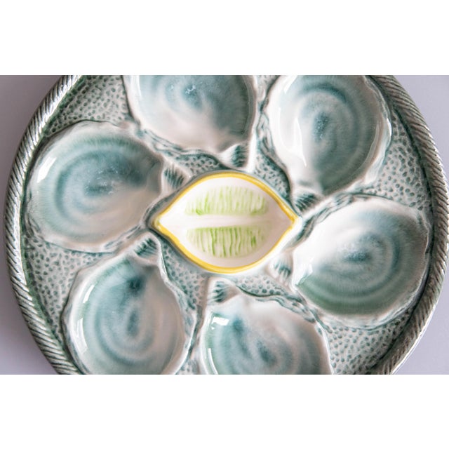 A lovely antique French majolica trompe l'oeil oyster plate made at the famous St. Clement faience factory in the East of...