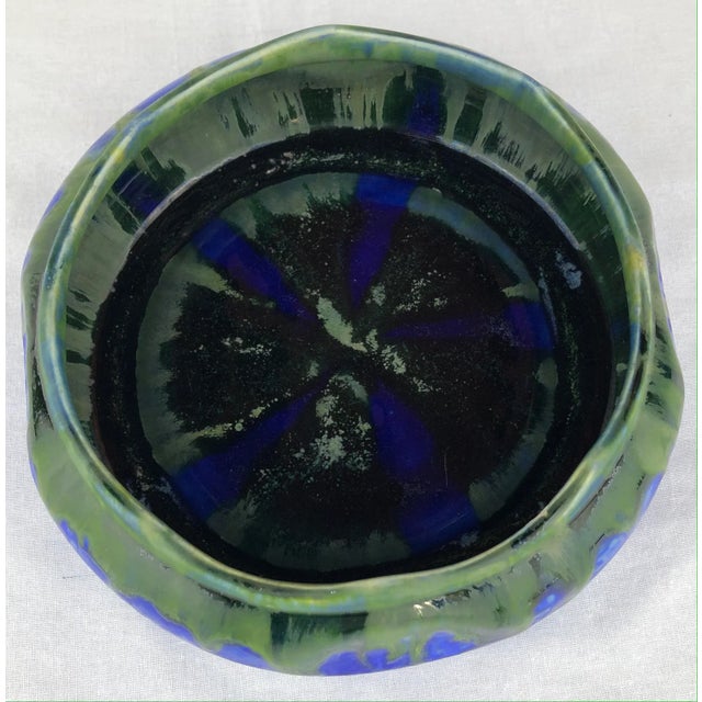 Beautiful French Art Deco bowl by Gilbert Méténier, signed. This Art Deco period piece features magnificent colors and is...