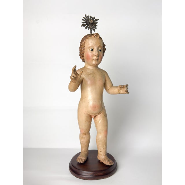 This 17th-century Flemish Baroque tabletop sculpture from Mechelen represents the Infant Jesus, arms outstretched in...