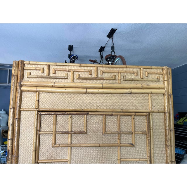 Beautiful well made vintage bamboo and raffia armoire. So many possible uses. Could work for storage, a minibar, TV, etc....