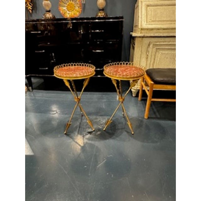 These Italian style gilt iron arrow tables are a unique and elegant addition to any home. The iron handles shaped like...