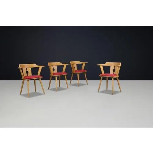 Mid-Century French Bistro Armchair in Beech and Red Upholstery, 1950s — An iconic example of 1950s French bistro design,...