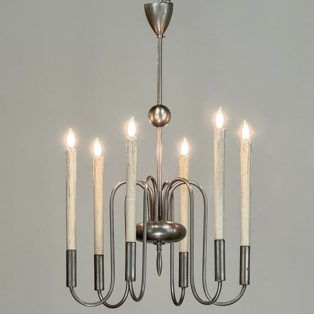 Mid Century French Modern Brushed Aluminum Chandelier is perfect for today's contemporary styles, and adds grace and charm...