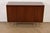 An outstanding Mid-Century Modern sideboard, credenza, dresser, or bar cabinet By Paul McCobb for Directional and produced...