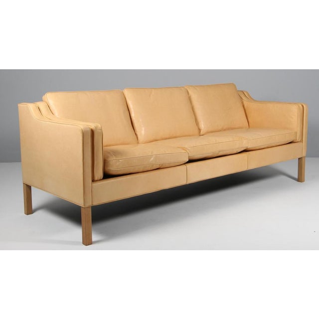 Børge Mogensen three-seat sofa new upholstered with elegance aniline leather. Legs of oak. Model 2213, made by Fredericia...