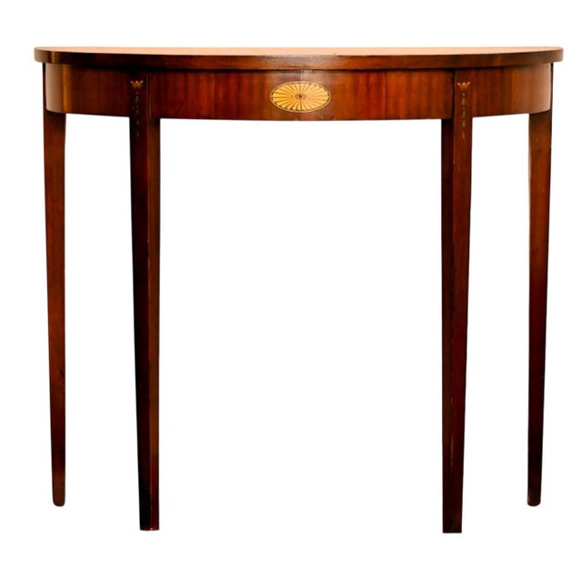 Federal Style Demilune Table. The console table in this setting create an elegant and classic display, ideal for an...