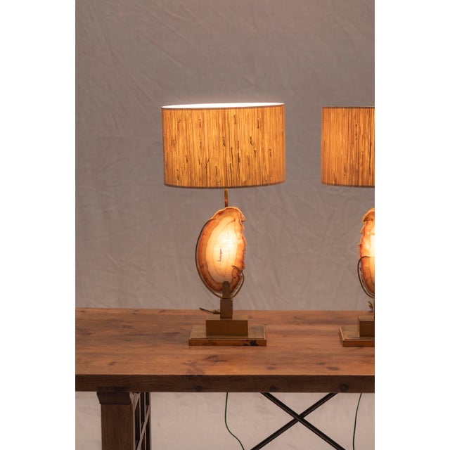 This impressive set of two table lamps, attributed to Belgian designer Willy Daro, is a striking example of Hollywood...