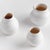 With a matteWhite glaze and cold finish, these three bud vases are simple and raw. A freshly made ceramic trio direct from...