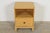 A sleek and stylish Mid-Century Modern or Hollywood Regency single-drawer nightstand By T.H. Robsjohn-Gibbings for...