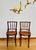 Pair of antique bentwood café chairs with marquetry iris seats, embossed "Made in Romania for B.M. Lawrence Company, San...